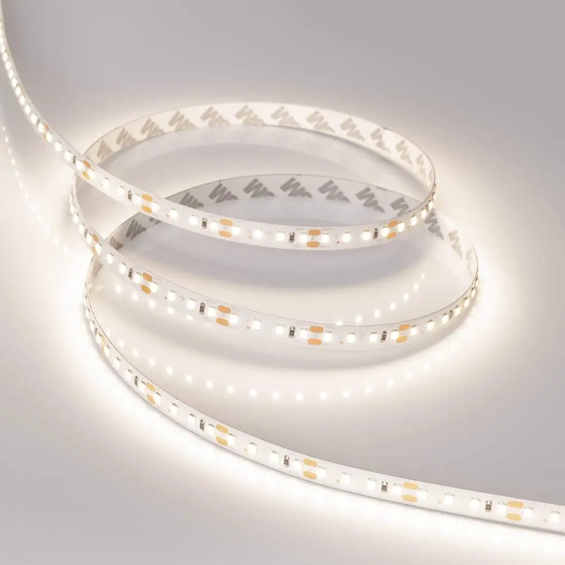 Светодиодная лента Arlight 9.6W/m 120LED/m 2835SMD дневной белый 30M 038804 – фото товара